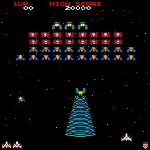 Galaga arcade attract mode gameplay screen showing Free Play enabled with High Score Save Kit installed